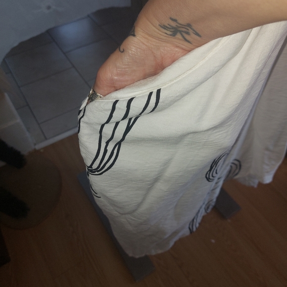 Amanda Collection, Flowy White Dress, with Black Swirl Designs. - Picture 3 of 5